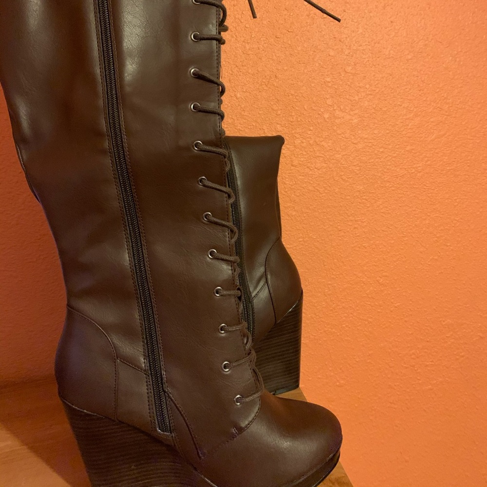 Knee high lace up combat wedge boots